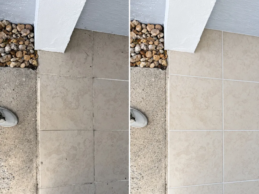 Side-by-side comparison of an outdoor tile walkway, the darkened untreated surface beside the cleaned section